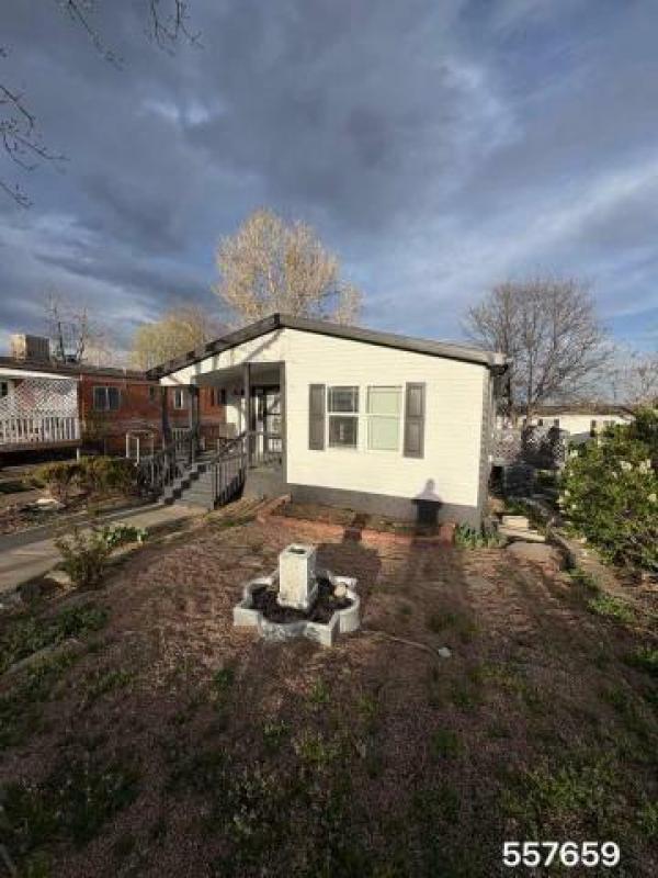 Photo 1 of 2 of home located at Pine Lakes Ranch 4211 E 100th Ave Lot 384 Denver, CO 80229