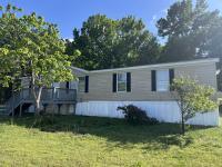 1999 Palm Harbor 56D1PH Manufactured Home
