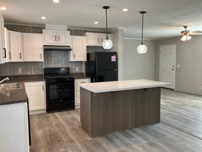 Photo 4 of 12 of home located at W10445 Hwy 16 West, Site # 8 Portage, WI 53901