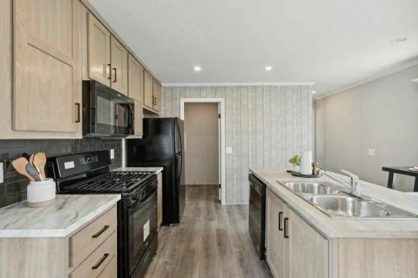 Photo 1 of 2 of home located at 46619 Bonaparte Dr, Site #936 Macomb, MI 48044