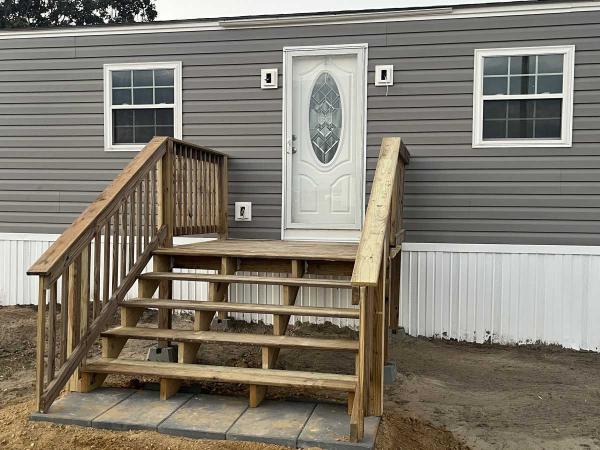 Photo 1 of 2 of home located at 103 Farmstead Circle - Pleasant Acres Mhp Dudley, NC 28333
