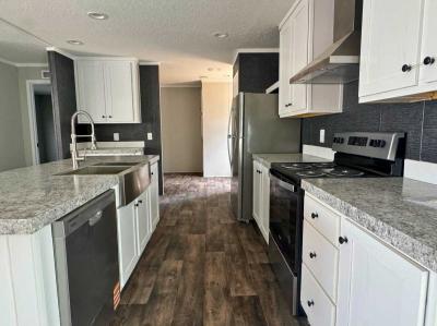 Photo 4 of 18 of home located at 11611 Sir Lawrence Court, Site 10 Thonotosassa, FL 33592