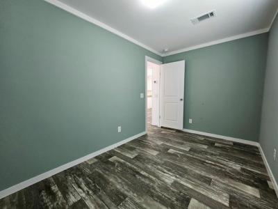 Photo 5 of 12 of home located at 6681 Hidden Oaks Dr. North Fort Myers, FL 33917