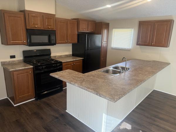 Photo 1 of 2 of home located at 3831 SW Southpark Ave. Lot# E21 Topeka, KS 66609