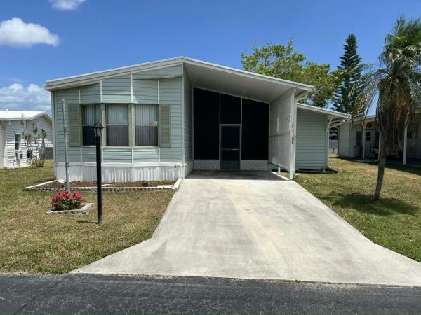 Photo 1 of 2 of home located at 7067 SE Rosewood Lane Stuart, FL 34997