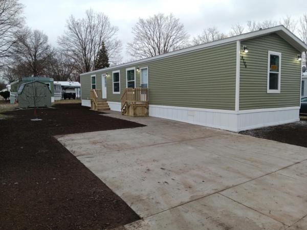 Photo 1 of 2 of home located at 5704 Pinebrook Ave. SE Kentwood, MI 49548