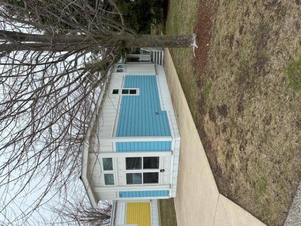 Photo 1 of 2 of home located at 5505 Charlevoix Ave Lot 013 Petoskey, MI 49770