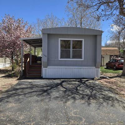 Photo 4 of 52 of home located at 6705 S Sante Fe Dr, #108 Littleton, CO 80120
