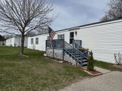 Photo 3 of 10 of home located at 6685 M-66 North Lot 124 Charlevoix, MI 49720