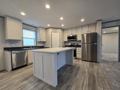 Photo 2 of 18 of home located at 7204 East Grand River Ave Lot 440 Portland, MI 48875
