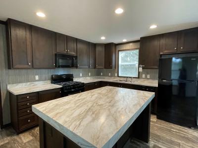 Photo 2 of 9 of home located at 244 Maclaren Ct Highland, MI 48357