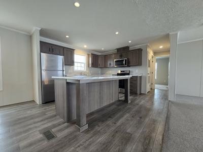 Photo 2 of 15 of home located at 7204 East Grand River Ave Lot 485 Portland, MI 48875