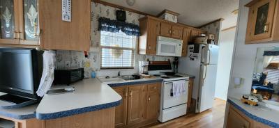 Photo 3 of 14 of home located at 7820 Wire Road 283 Zephyrhills, FL 33540