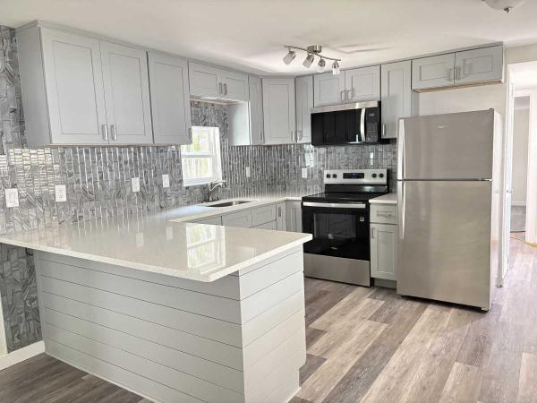 Photo 1 of 2 of home located at 1100 Curlew Road Lot 187 Dunedin, FL 34698