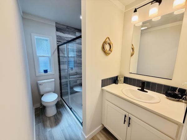 2024 Great Outdoor Cottages 2112BW G2 (8 porch) - GOC Mobile Home