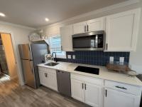 2024 Great Outdoor Cottages 2112BW G2 (8 porch) - GOC Mobile Home