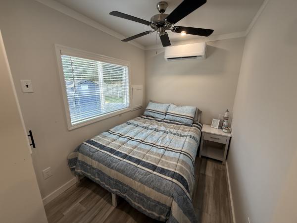 2024 Great Outdoor Cottages 2112BW G2 (8 porch) - GOC Mobile Home