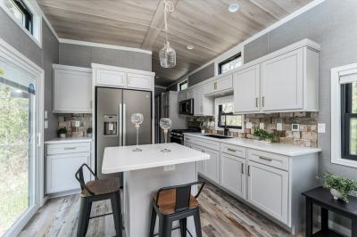 Photo 5 of 13 of home located at 261 Point Sebago Road, Lot Mc003 Casco, ME 04015