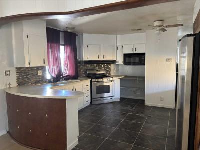 Photo 3 of 8 of home located at 3901 Stewart Ave Las Vegas, NV 89110