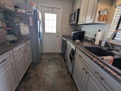 Photo 3 of 41 of home located at 7100 Ulmerton Rd, Lot 911 Largo, FL 33771