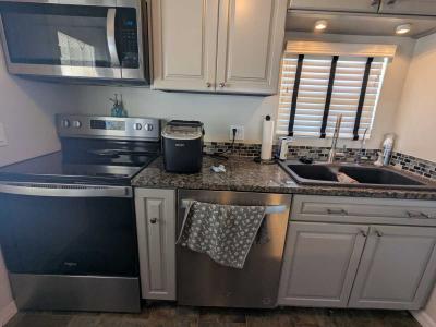 Photo 5 of 41 of home located at 7100 Ulmerton Rd, Lot 911 Largo, FL 33771