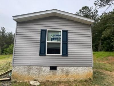 Photo 3 of 16 of home located at 1565 Boyles Mill Rd Dalton, GA 30721