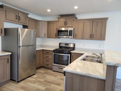 Photo 2 of 6 of home located at 2331 S Dundee Ct Highland, MI 48357