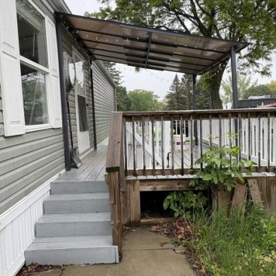 Photo 2 of 15 of home located at 203 Cadillac St. New Hudson, MI 48165