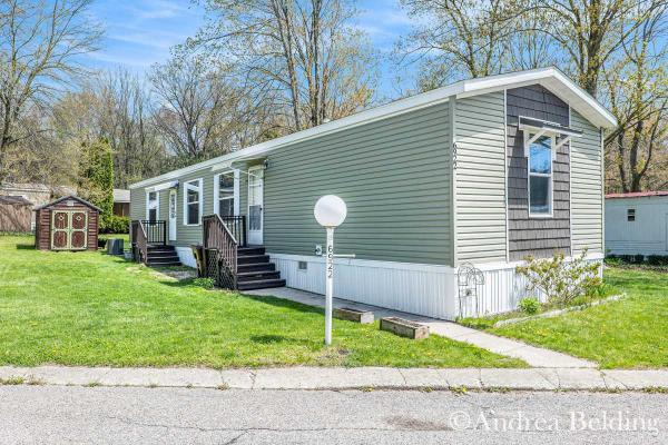 Photo 1 of 2 of home located at 6922 Knotty Pine Street NE Rockford, MI 49341
