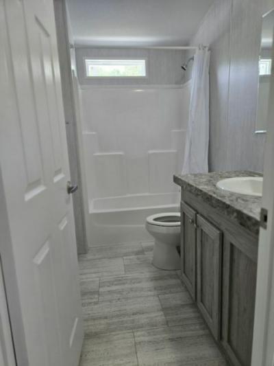 Photo 3 of 14 of home located at 3323 NE 14th St Lot A20 Ocala, FL 34470