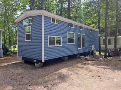 Photo 2 of 10 of home located at 261 Point Sebago Road, Lot S0894 Casco, ME 04015