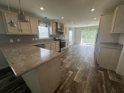 Photo 5 of 11 of home located at 26 Millwood Drive Uncasville, CT 06382