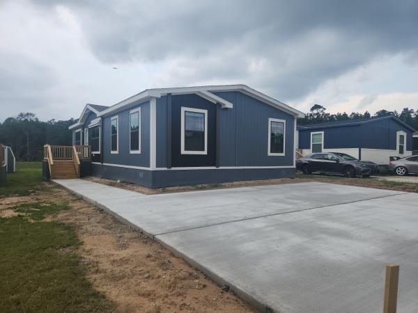 Photo 1 of 2 of home located at 8051 W Xavier St Conroe, TX 77303