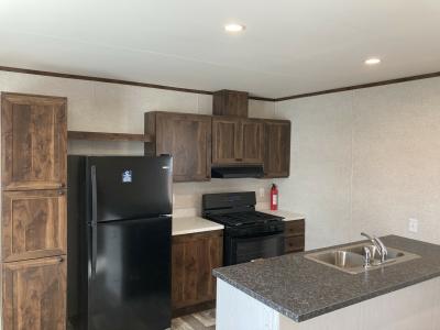 Photo 3 of 7 of home located at 32 Camelot Lane, Site # 25 Rice Lake, WI 54868