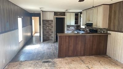 Photo 4 of 8 of home located at 401 S Maple St Carterville, MO 64835