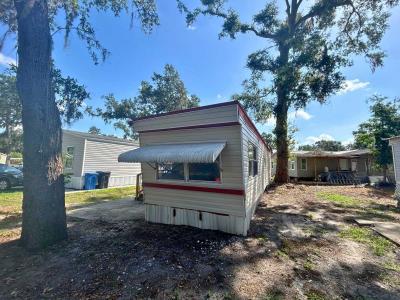 Mobile Home at 11611 Sir Lawrence Court, Site 107 Thonotosassa, FL 33592