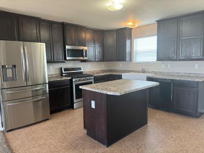 Photo 4 of 12 of home located at 3100 Coyote Lane Evans, CO 80620