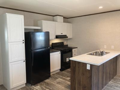 Photo 2 of 11 of home located at 32 Camelot Lane, Site # 125 Rice Lake, WI 54868