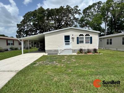 Photo 2 of 63 of home located at 1942 NW 46th Avenue Lot 299 Ocala, FL 34482