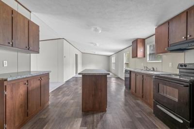 Photo 4 of 17 of home located at 201 N 6th St Coal Hill, AR 72832