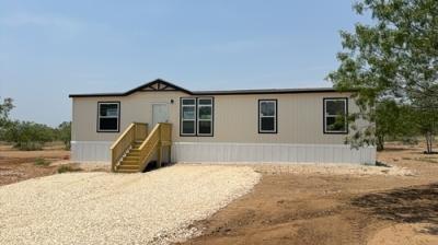 Photo 1 of 26 of home located at 1394 Private Road 2630 Moore, TX 78057