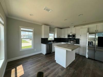 Photo 4 of 6 of home located at 28 Open Range Trail Willis, TX 77318