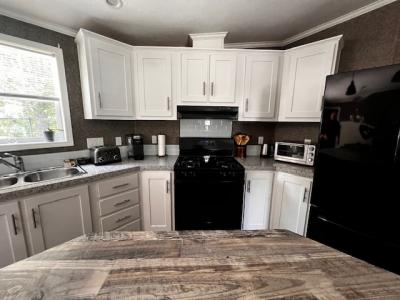 Photo 4 of 21 of home located at 7 Deer Hill Avenue Standish, ME 04084