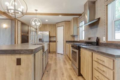Photo 5 of 7 of home located at 714 Mill Street Site 38 Leslie, MI 49251