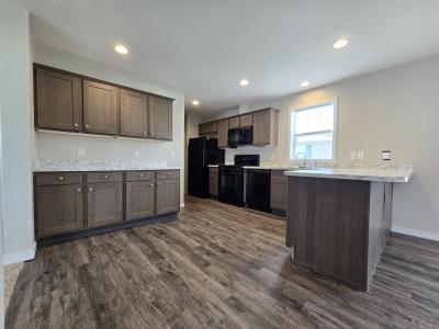 Photo 3 of 15 of home located at 7204 East Grand River Ave Lot 288 Portland, MI 48875