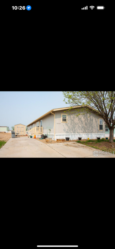 Photo 2 of 11 of home located at 10765 Aspen Street Firestone, CO 80504