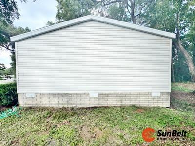 Photo 2 of 50 of home located at 1832 NW 46th Circle Lot 311 Ocala, FL 34472