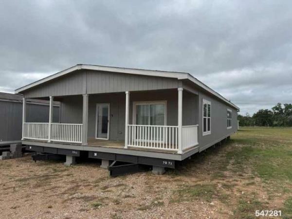Photo 1 of 2 of home located at Bastrop Home Source Llc 1547 Hwy 71W Cedar Creek, TX 78612