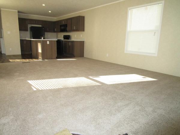 Photo 1 of 2 of home located at 1908 E 19th St. Lot E-65 Lot E065 Lawrence, KS 66046