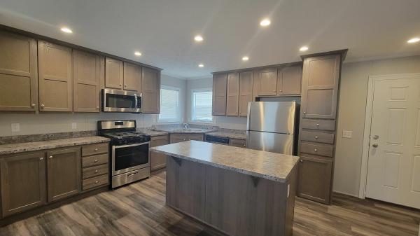 Photo 1 of 2 of home located at 842 Pinewood Ct. Lot B33 Columbus, MI 48063